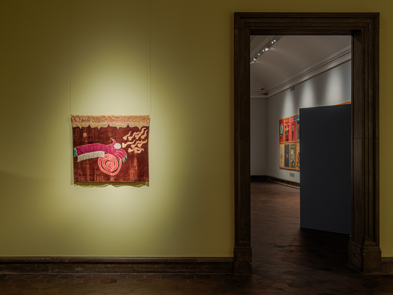 Quilted artwork mounted on wall